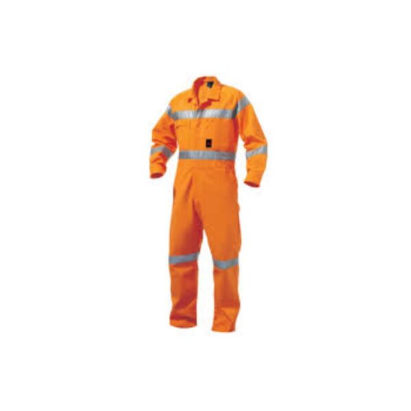 Worker wearing flame-resistant clothing in industrial welding environment